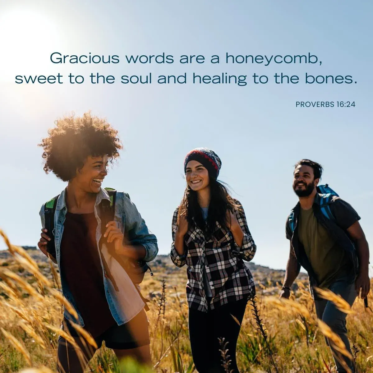 group of smiling, happy friends on a hike — Bible verse about kindness
