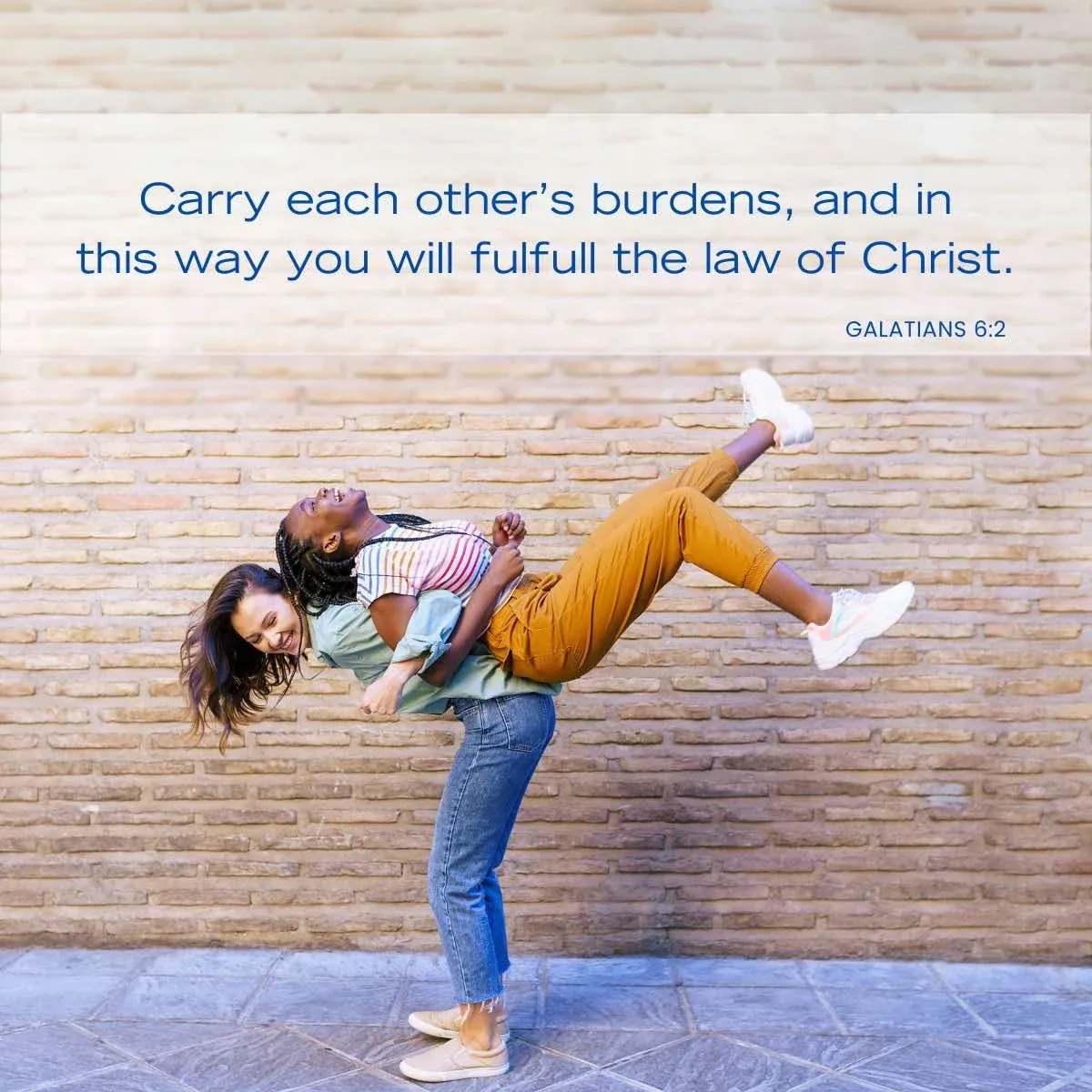 a friend carrying the weight of another friend on her back — Bible verse about being empathetic