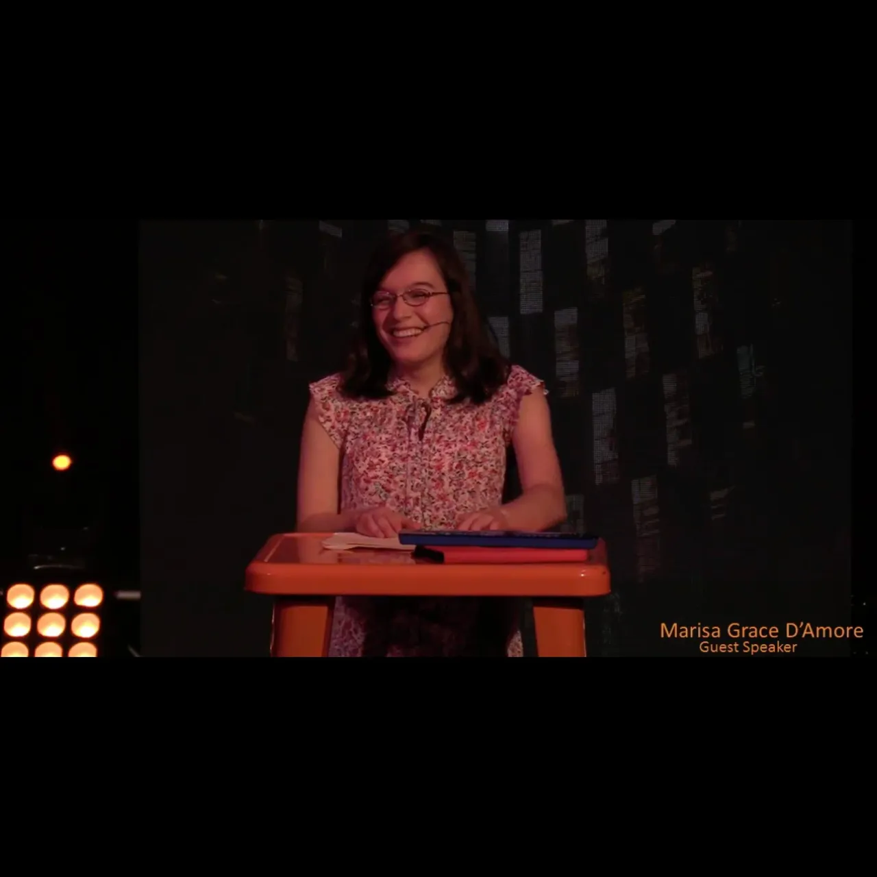 Marisa D'Amore speaking at an event