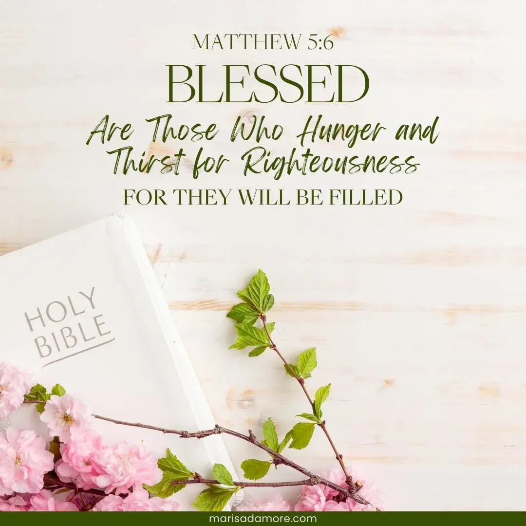 pink flowers a bible a wood tabletop with image text