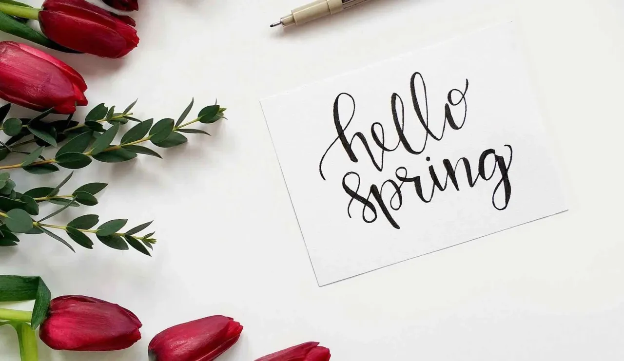 hello spring written on paper